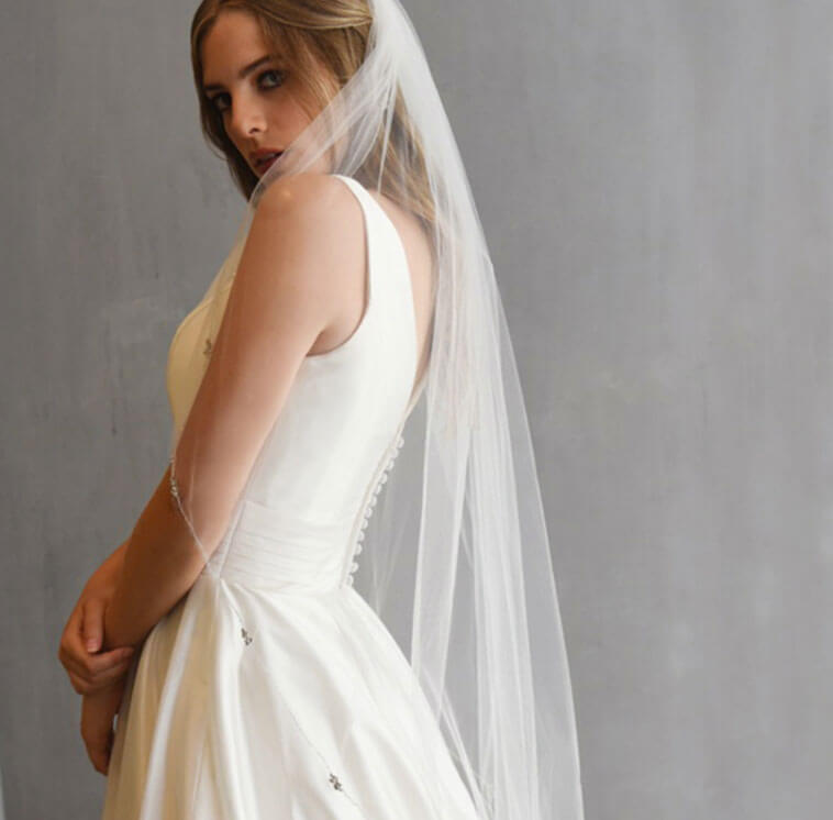 Model wearing a long veil