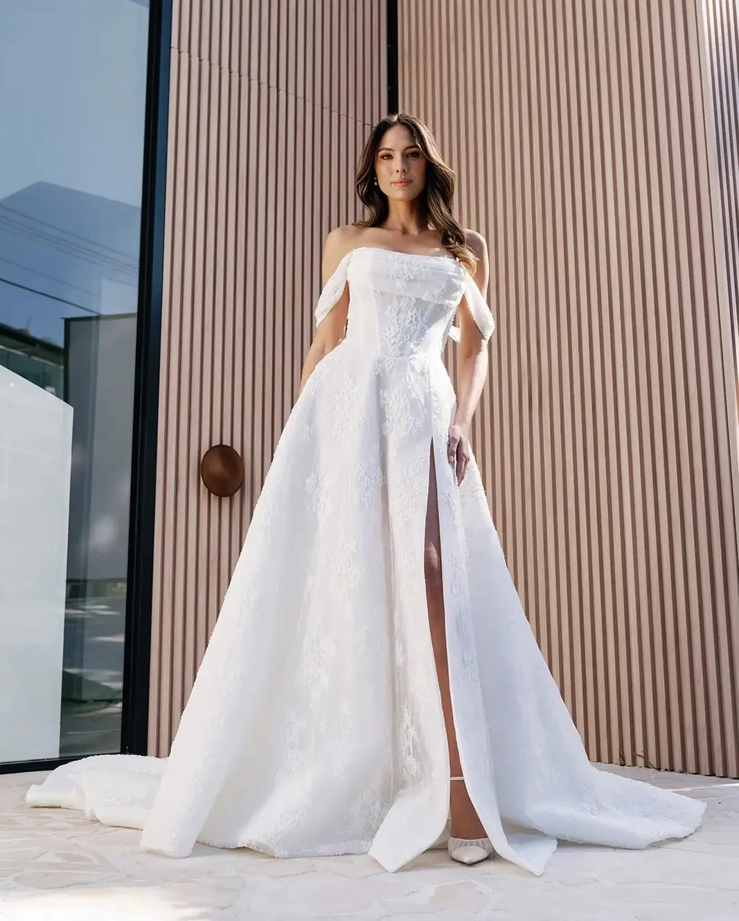 Model wearing a Lillian West Gown