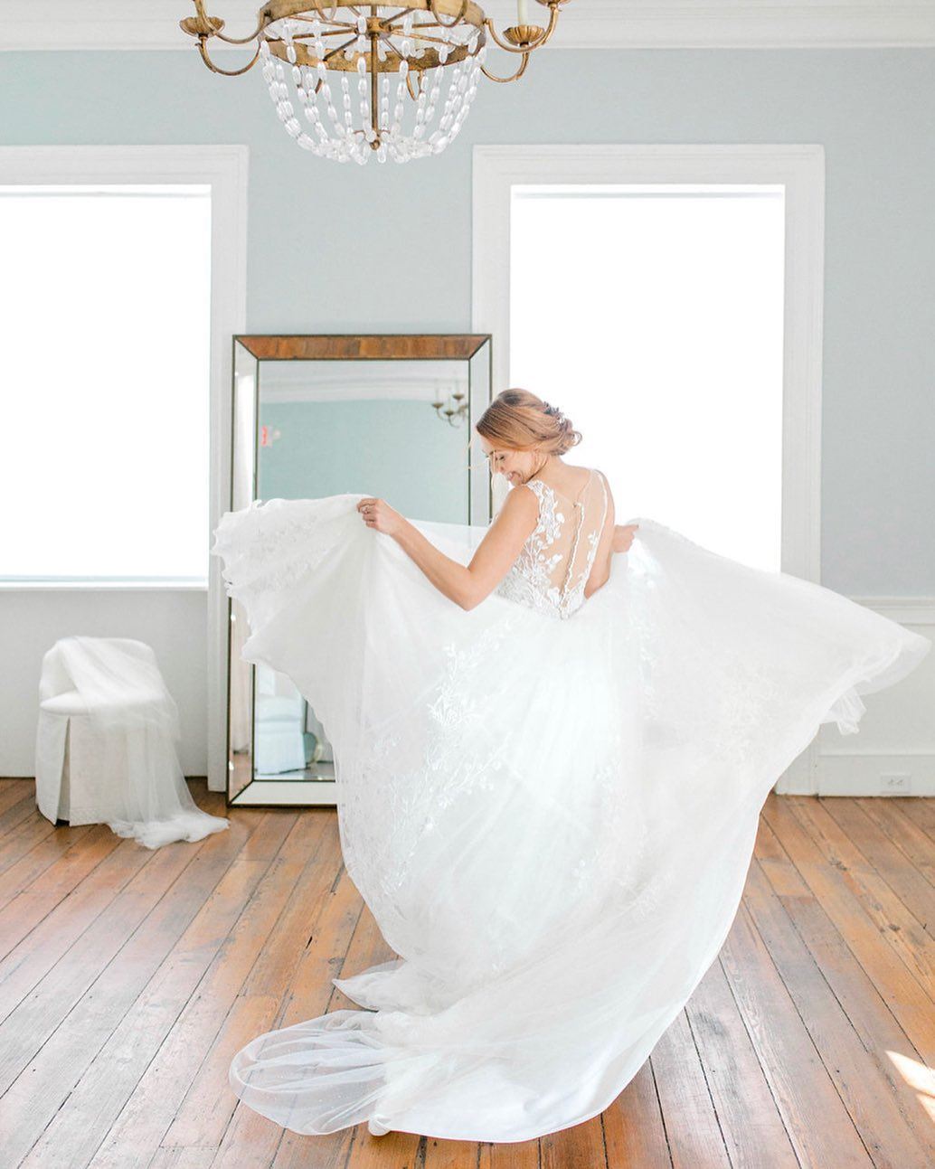 Model wearing a white gown